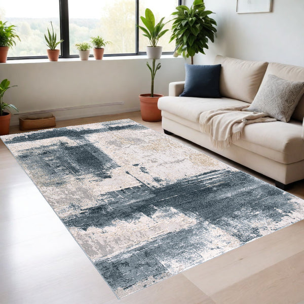 Homeroots 4' X 6' Blue And Beige Abstract Washable Non Skid Area Rug  Other Material 524873