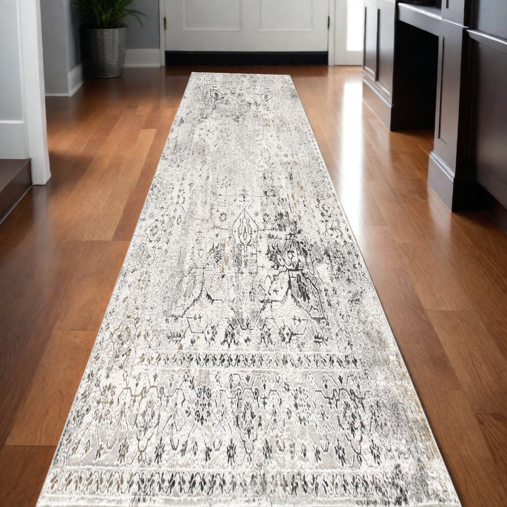 Homeroots 13' Gray And Ivory Oriental Washable Non Skid Runner Rug  Polyester 524877