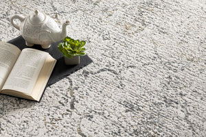 Homeroots 10' Gray And Ivory Abstract Distressed Runner Rug  Polyester 524904