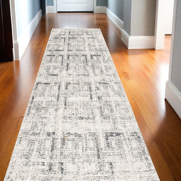 Homeroots 10' Ivory And Gray Geometric Distressed Runner Rug  Polyester 524914