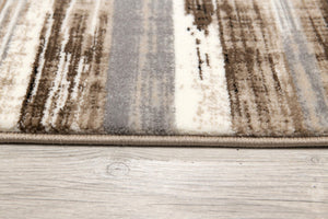 HomeRoots 5' Brown Round Abstract Area Rug - Stylish Geometric Design, Washable, Non-Skid, Durable & Versatile 524922