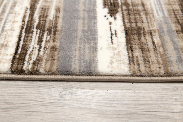 HomeRoots 5' Brown Round Abstract Area Rug - Stylish Geometric Design, Washable, Non-Skid, Durable & Versatile 524922