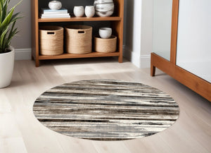 Homeroots 7' Beige Brown And Gray Abstract Distressed Round Rug  Olefin 524923