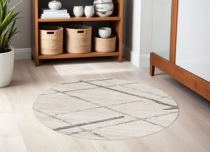 Homeroots 5' Beige And Gray Abstract Distressed Round Rug  Polypropylene 524985