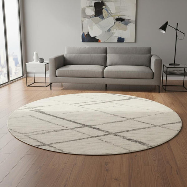 HomeRoots 8' Beige and Gray Abstract Distressed Round Rug - Soft, Stain-Resistant, Modern Design for Any Room 524986