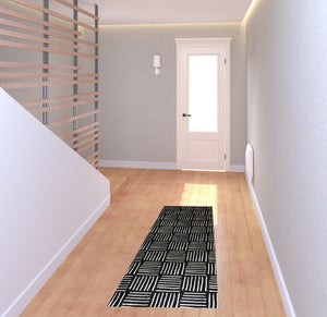 Homeroots 6' Black And Off White Abstract Machine Tufted Washable Runner Rug With Uv Protection  Synthetic 526180