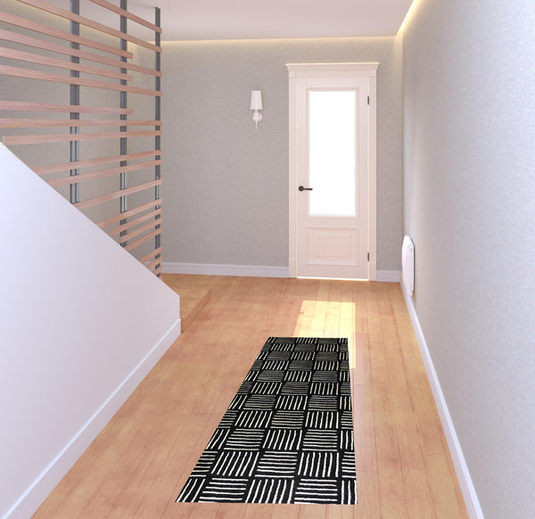 Homeroots 6' Black And Off White Abstract Machine Tufted Washable Runner Rug With Uv Protection  Synthetic 526180