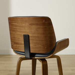 Homeroots Black And Brown Upholstered Faux Leather Curved Back Dining Side Chair  Wood 526379