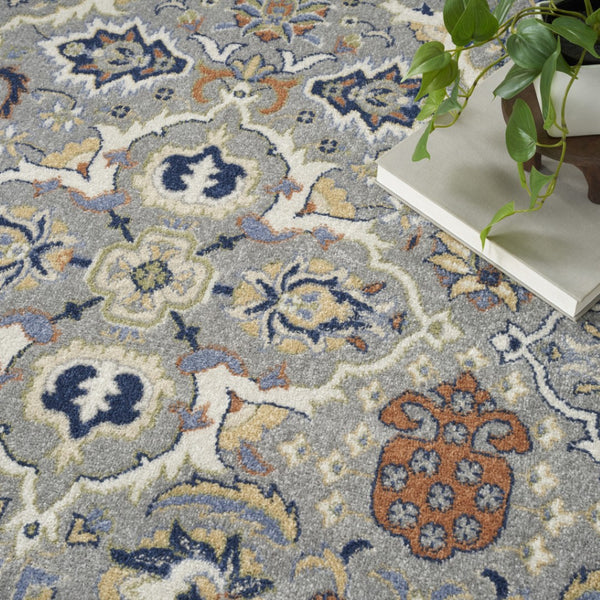 HomeRoots 5' Green and Ivory Floral Power Loom Area Rug – Timeless Charm for High-Traffic Living Spaces 8' X 10' 527657