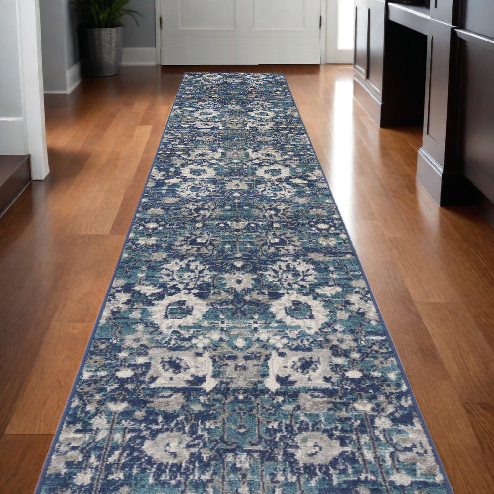 Homeroots 10' Runner Blue And Ivory Floral Power Loom Distressed Runner Rug  Polypropylene 527715