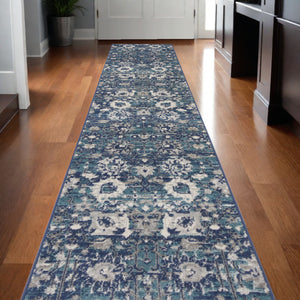 Homeroots 10' Runner Blue And Ivory Floral Power Loom Distressed Runner Rug  Polypropylene 527715