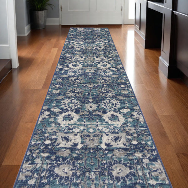 Homeroots 10' Runner Blue And Ivory Floral Power Loom Distressed Runner Rug  Polypropylene 527715