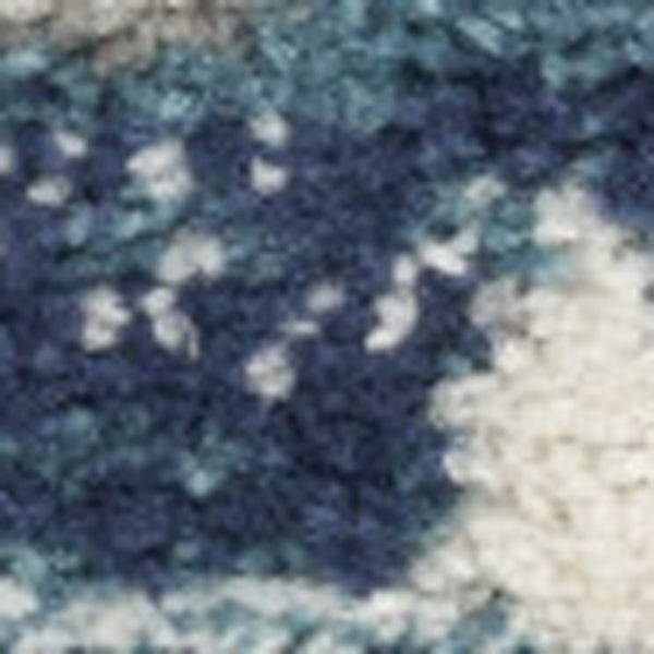 Homeroots 10' Runner Blue And Ivory Floral Power Loom Distressed Runner Rug  Polypropylene 527715