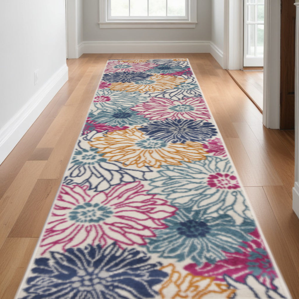 Homeroots 10' Runner Ivory And Blue Floral Power Loom Runner Rug  Polypropylene 527731