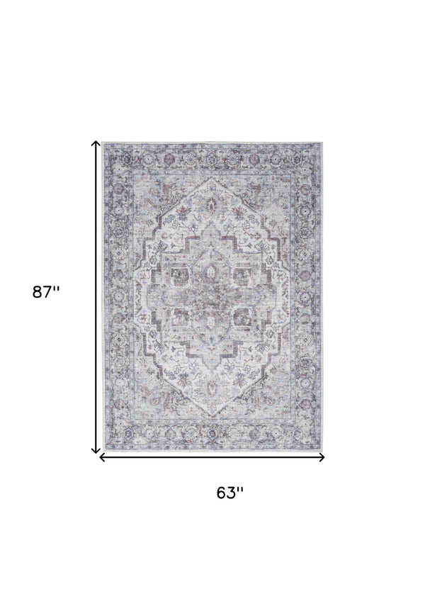 Homeroots 5' X 7' Blue And Pink Floral Power Loom Distressed Washable Area Rug  Polyester 527751