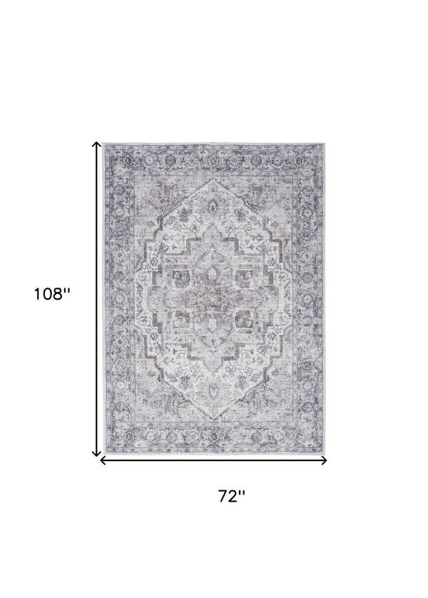 Homeroots 6' X 9' Blue And Pink Floral Power Loom Distressed Washable Area Rug  Polyester 527752