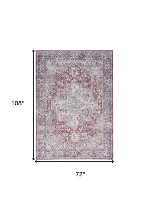 Homeroots 6' X 9' Blue And Pink Floral Power Loom Distressed Washable Area Rug  Polyester 527753