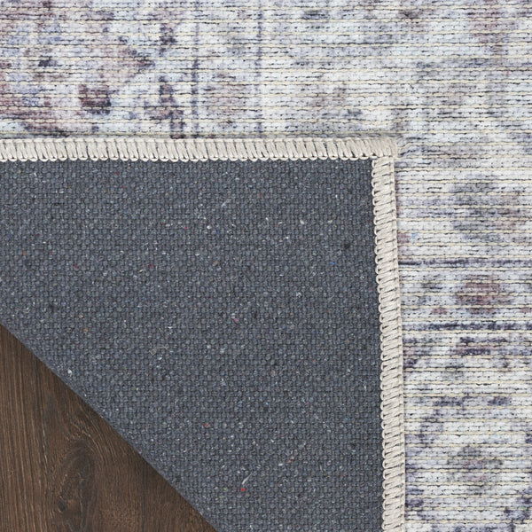 Homeroots 6' X 9' Blue And Pink Floral Power Loom Distressed Washable Area Rug  Polyester 527758