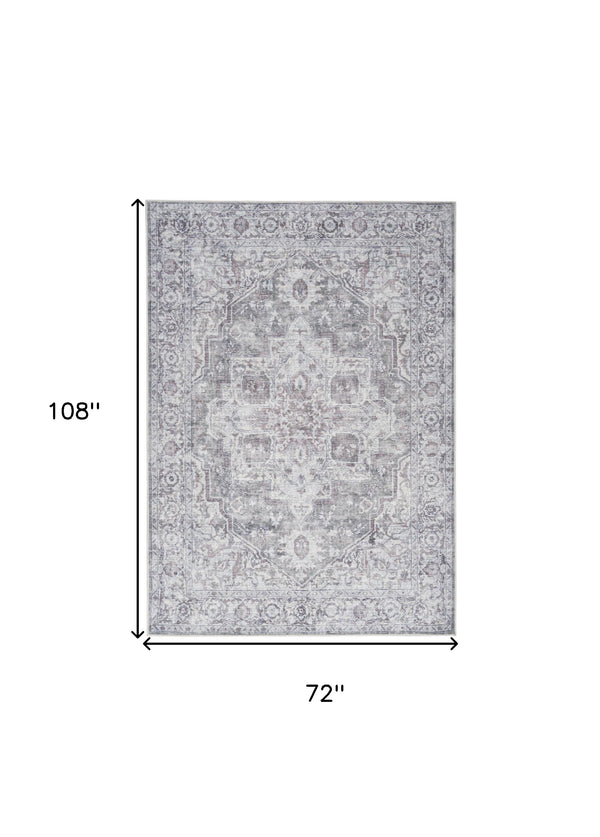 Homeroots 6' X 9' Blue And Pink Floral Power Loom Distressed Washable Area Rug  Polyester 527758
