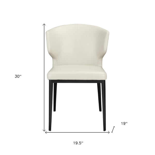 HomeRoots Set of Two Elegant Beige and Black Wing Back Dining Chairs - Upholstered Faux Leather Comfort 527813