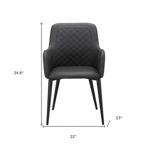 HomeRoots Set of Two Stylish Tufted Black Faux Leather Dining Arm Chairs for Modern Elegance and Comfort 527815
