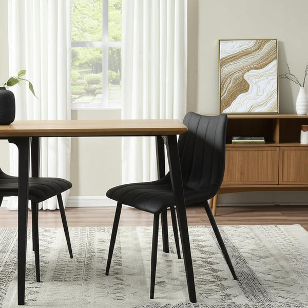 HomeRoots Set of Two Stylish Black Faux Leather Dining Chairs with Metal Frame for Modern Spaces 527824
