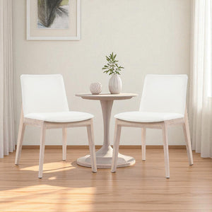 HomeRoots Set of Two Stylish Upholstered Faux Leather Dining Chairs with Natural-Finish Legs for Versatility 527827