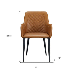 HomeRoots Set of Two Contemporary Tufted Tan and Black Faux Leather Dining Armchairs for Stylish Spaces 527835