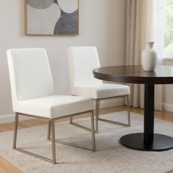 HomeRoots Set of Two Modern White Faux Leather Dining Chairs with Silver Legs for Stylish Comfort & Versatility 527868