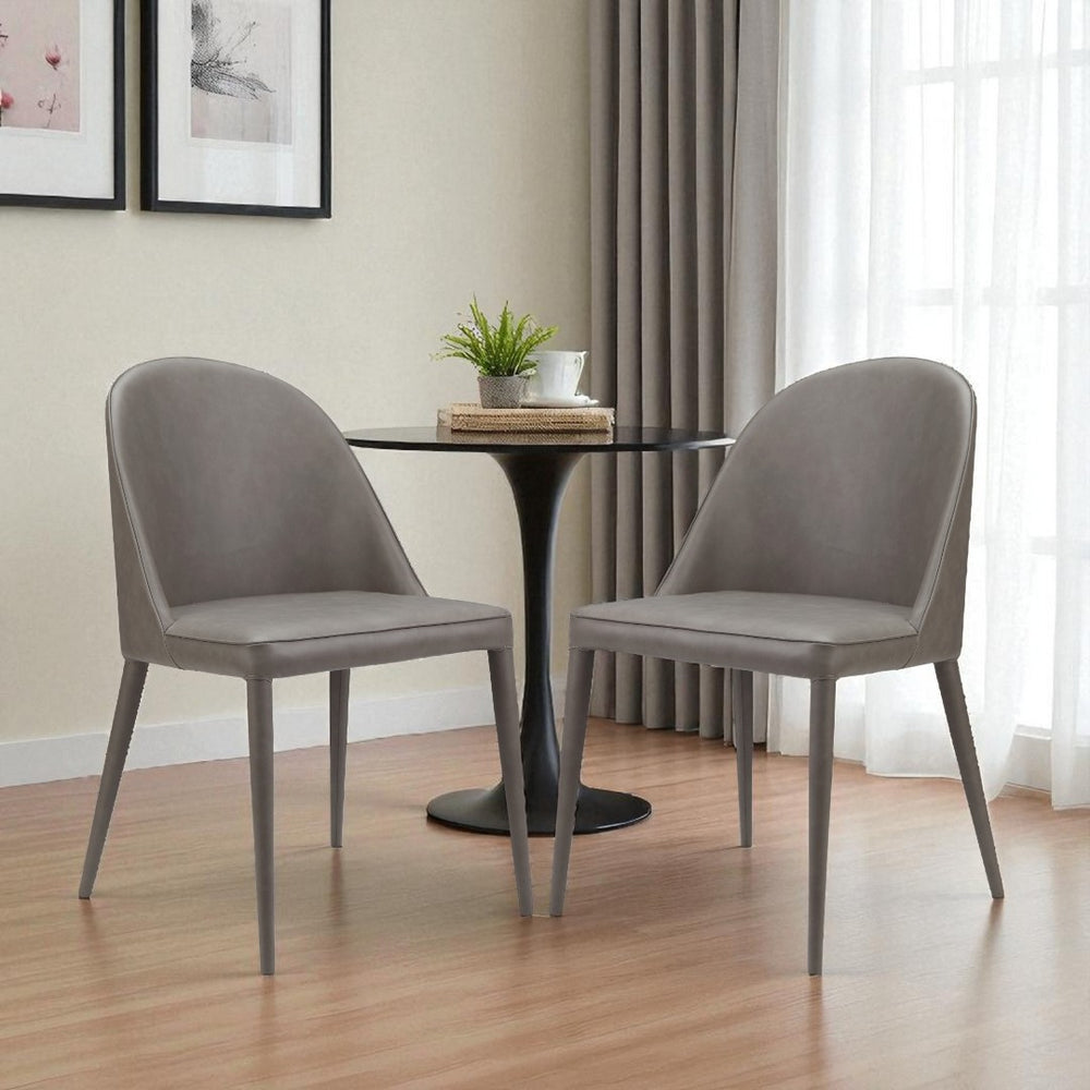 HomeRoots Set of Two Stylish Gray Faux Leather Dining Chairs - Modern Upholstered Accent Seating for Any Room 527876