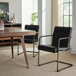 HomeRoots Set of Two Contemporary Black Leather and Iron Dining Chairs for Stylish Comfort and Versatility 527911