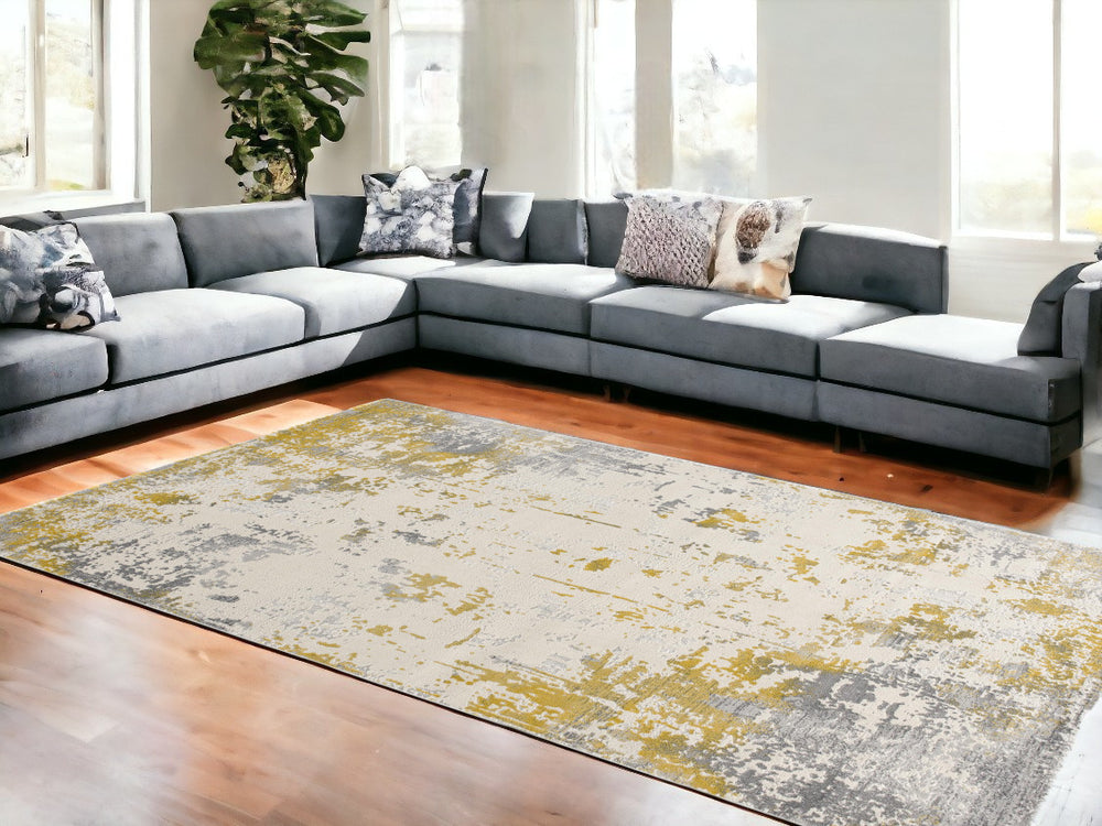 Homeroots 10' X 14' Gold And Ivory Abstract Washable Non Skid Area Rug  Polypropylene 528818