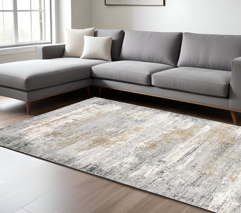Homeroots 9' X 12' Gold Gray And Ivory Abstract Washable Non Skid Area Rug  Viscose 528827