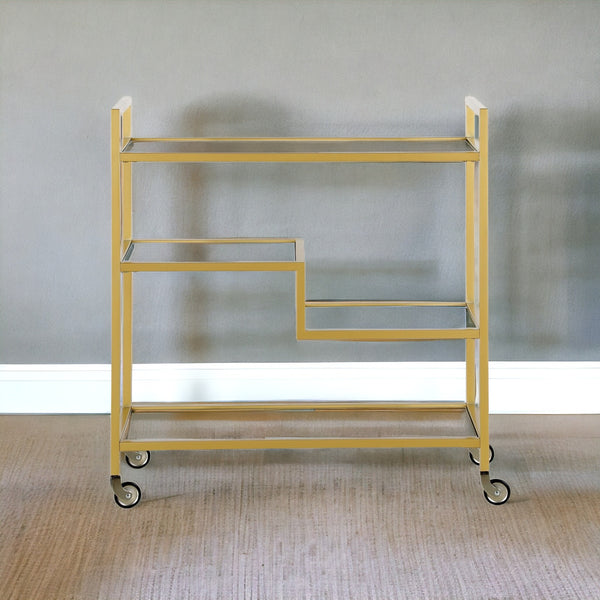 Homeroots Brass Steel And Glass Rolling Bar Cart   530450