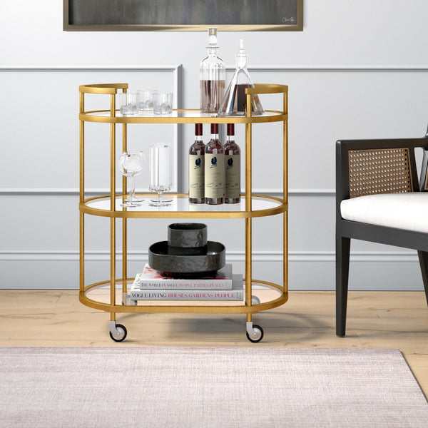 Homeroots Brass Steel And Glass Oval Rolling Bar Cart   530454