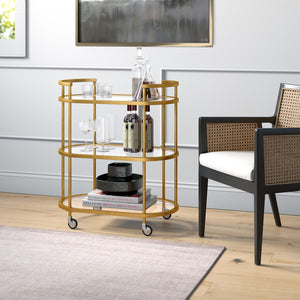 Homeroots Brass Steel And Glass Oval Rolling Bar Cart   530454