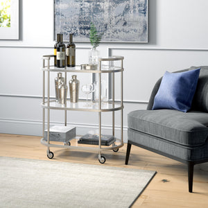 Homeroots Nickel Steel And Glass Oval Rolling Bar Cart   530456