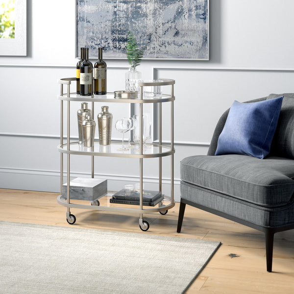 Homeroots Nickel Steel And Glass Oval Rolling Bar Cart   530456