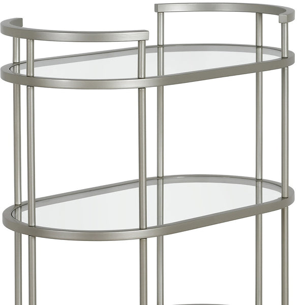 Homeroots Nickel Steel And Glass Oval Rolling Bar Cart   530456