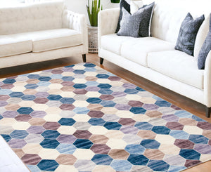 Homeroots 5' X 8' Ivory And Blue Geometric Distressed Area Rug  Polyester 530532