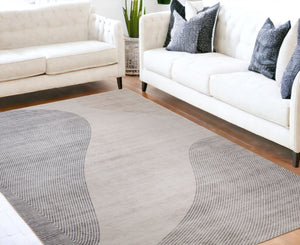HomeRoots 5' Abstract Distressed Area Rug in Beige and Brown – Stylish, Stain-Resistant Design for Any Room 5' X 8' 530544
