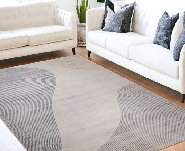 HomeRoots 5' Abstract Distressed Area Rug in Beige and Brown – Stylish, Stain-Resistant Design for Any Room 5' X 8' 530544