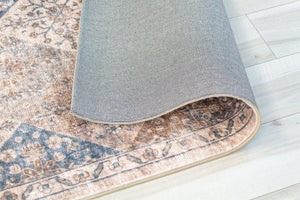 Homeroots 7' X 10' Brown And Blue Floral Distressed Area Rug  Polyester 530557