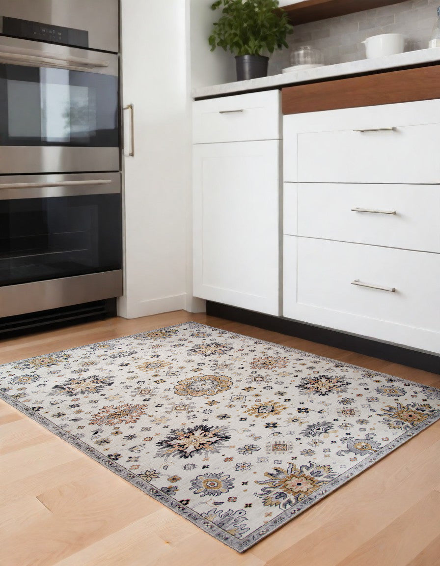 Homeroots 4' X 6' Cream Floral Area Rug  Polyester 530563