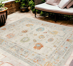 Homeroots 8' X 10' Blue And Orange Floral Stain Resistant Indoor Outdoor Area Rug Beige Polypropylene 531490