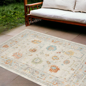 Homeroots 9' X 12' Blue And Orange Floral Stain Resistant Indoor Outdoor Area Rug Beige Polypropylene 531491