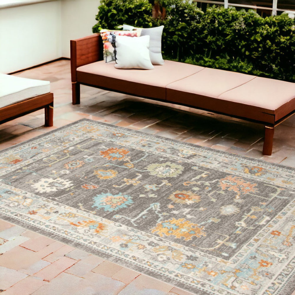 HomeRoots 5' Indoor Outdoor Blue and Orange Floral Area Rug - Stain Resistant, Durable, Stylish, Versatile Design Taupe 8'9" x 11'9" 531495
