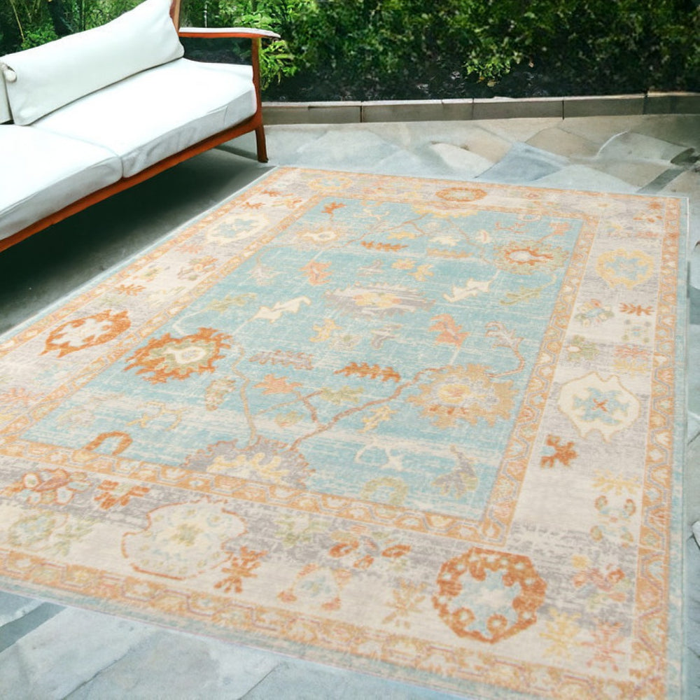 HomeRoots 5' Blue and Orange Floral Area Rug - Stain Resistant, Durable Design for Indoor or Outdoor Spaces Aqua 5'1" x 7'6" 531497