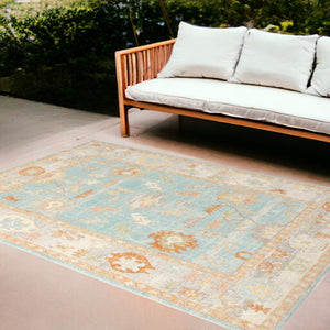 HomeRoots 5' Blue and Orange Floral Area Rug - Stain Resistant, Durable Design for Indoor or Outdoor Spaces Aqua 7'9" x 9'9" 531498