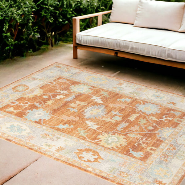 HomeRoots 5' Blue and Orange Floral Area Rug - Stain Resistant, Durable Design for Indoor or Outdoor Spaces Orange 7'9" x 9'9" 531502